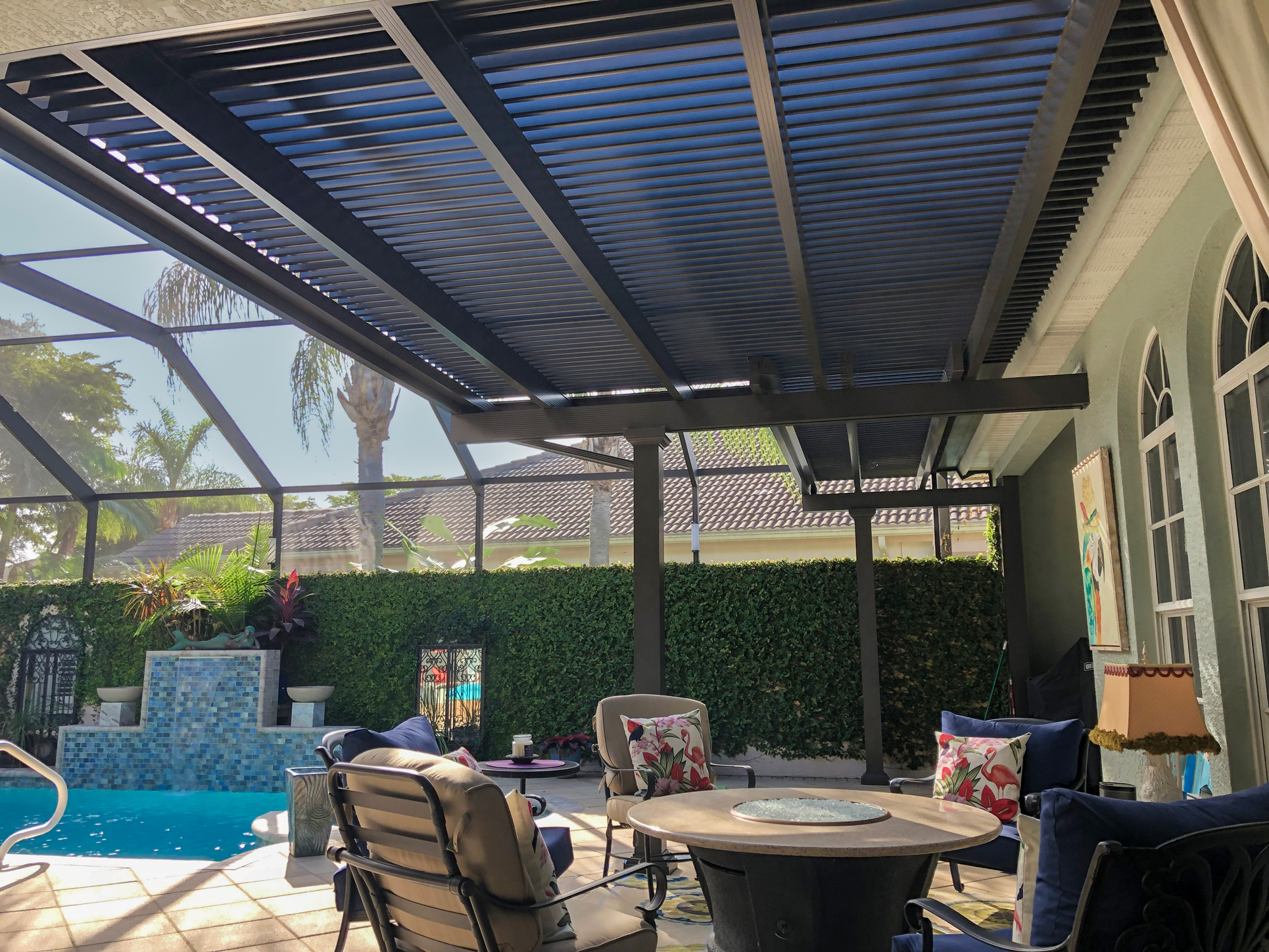 Attached contemporary pergola in bronze